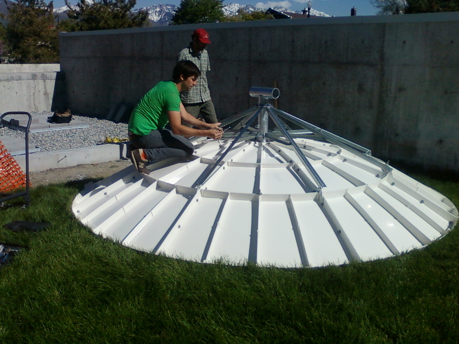 May 12, 2011: KCPW employees piece the dish together
