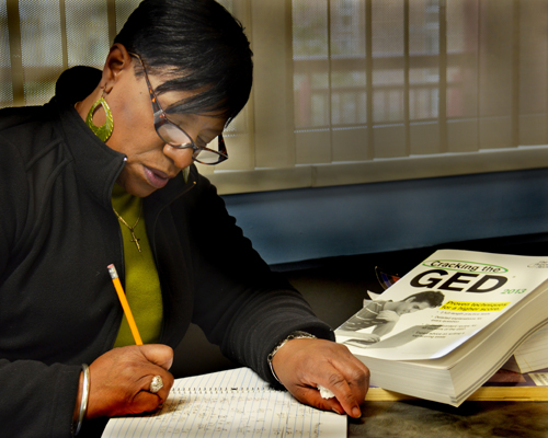 Studying for the GED at an adult education school in Washington, D.C. Photo by Emily Hanford