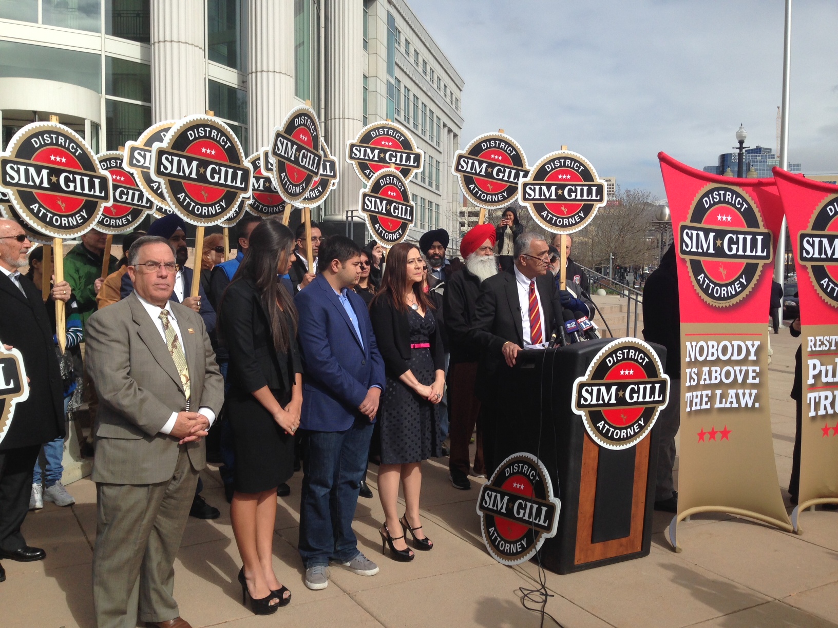 Salt Lake County District Attorney Sim Gill announces his reelection outside the Matheson Courthouse in downtown Salt Lake City.