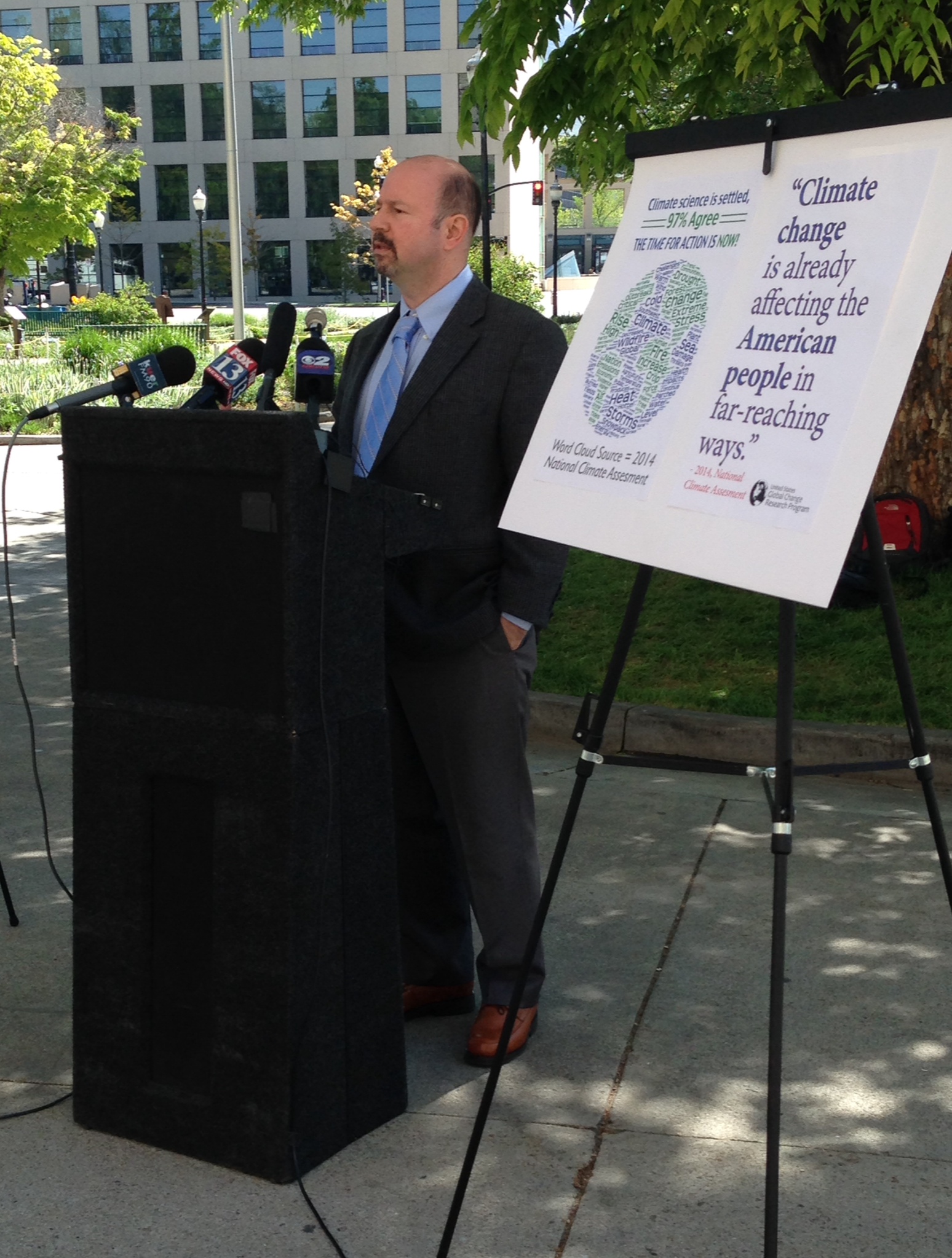 Dr. Michael Mann, a climatologist from Penn State University, speaks outside the Salt Lake City and County Building on May 14, 2014.