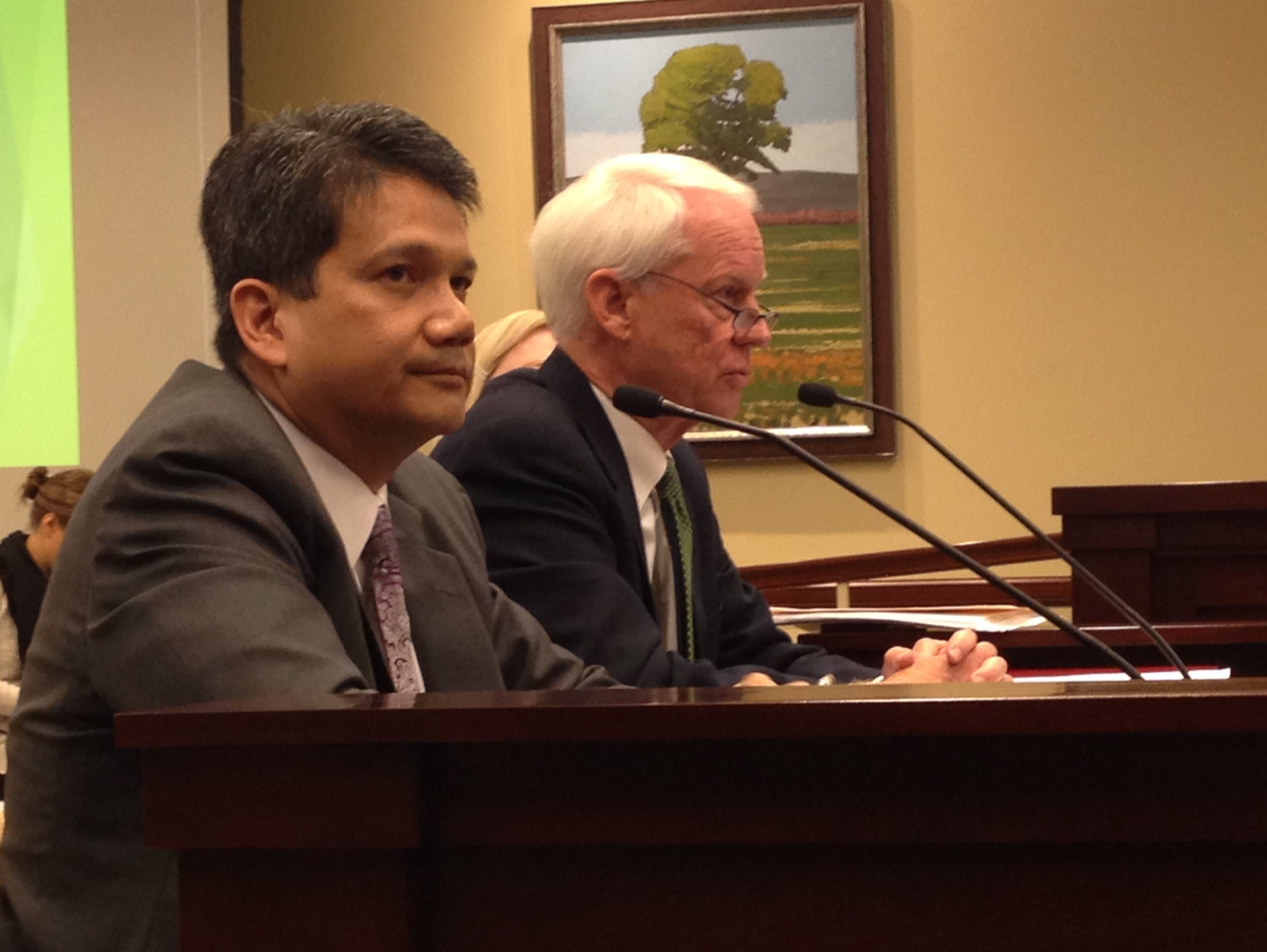 DABC Executive Director Sal Petilos (L) and Commissioner John Nielsen take questions during a legislative hearing on June 16, 2014.