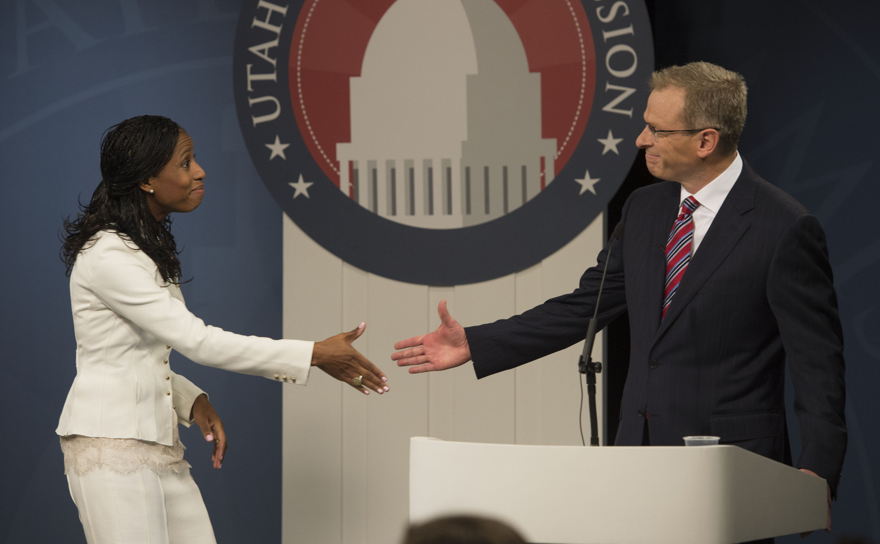 Mia Love shakes hands with Doug Owens following a debate in the 4th District, in Utah's premier congressional matchup at the Dolores Dor Eccles Broadcast Center on the University of Utah campus in Salt Lake City, Tuesday, October 14, 2014. (Credit: Steve Griffin, The Salt Lake Tribune)